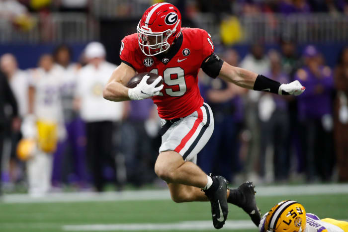 Brock Bowers (19) moves the ball during the first half of the SEC Championship NCAA college football game between LSU and Georgia in Atlanta, on Saturday, Dec. 3, 2022. News Joshua L Jones